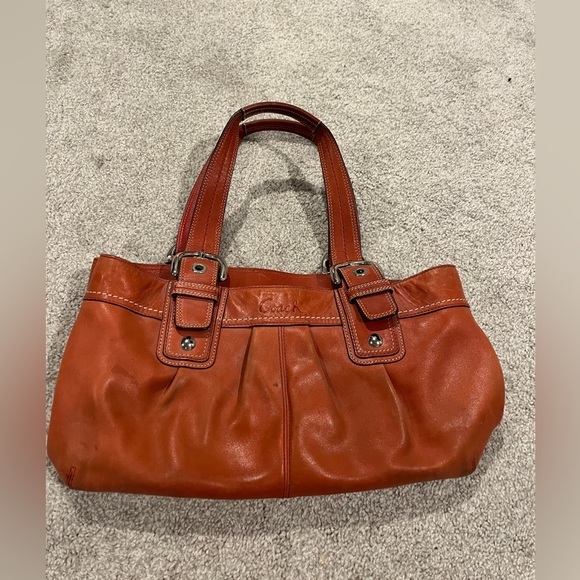 Coach Handbags - Coach orange leather shoulder bag and hang tag soho